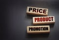 Price product promotion words on wooden blocks on black. Marketing sales concept