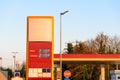 Gas station sign at sunset Royalty Free Stock Photo