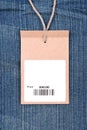 Price tag with barcode on jeans Royalty Free Stock Photo