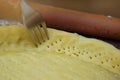 the Base of the Pastry Case all over with a Fork. Making Pie Tart. Royalty Free Stock Photo