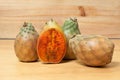 Prickly pear cactus fruits - Opuntia ficus indica; photo on wooden background Royalty Free Stock Photo