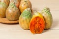 Prickly pear cactus fruits - Opuntia ficus indica; photo on wooden background Royalty Free Stock Photo