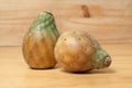 Prickly pear cactus fruits - Opuntia ficus indica; photo on wooden background Royalty Free Stock Photo