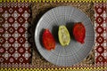 Prickly pear seasonal fruits & x28;Opuntia Cactus& x29; on geometrical plate