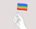 Pride month gay pride symbol - drawing hand waiving a rainbow flag - vector line art illustration for Pride celebration