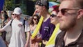 Pride parade Warsaw. Crowd of people in colorful clothing and with rainbow flags marcing for the lgbq right