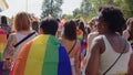 Pride parade Warsaw. Crowd of people in colorful clothing and with rainbow flags marcing for the lgbq right