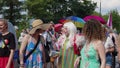 Pride parade Warsaw. Crowd of people in colorful clothing and with rainbow flags marcing for the lgbq right