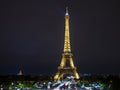 Fascinating night landscape of Paris with the glittering Eiffel Tower