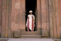 Priest at ancient rock hewn churches of lalibela ethiopia