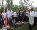 A priest blesses Easter baskets