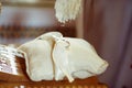 Priest blesses a wedding rings lying on a white pillow