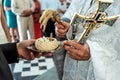 Priest blessing luxury wedding rings in the old church Royalty Free Stock Photo