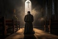 Christian priest standing by the altar.