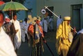 Priest carries the holy ark