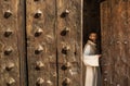 Priest in Cathedral Door