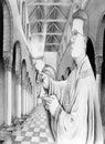 Priest with chalice in Church