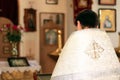 Priest in church reads prayer during religious rite Royalty Free Stock Photo