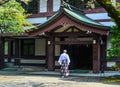 A priest coming to the ancient temple