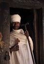 Priest on the doorway of Abuna Yemata Guh church