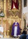 Priest giving mass in a church