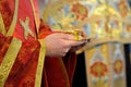 Priest holding bread and wine