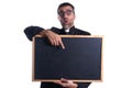 Priest holding empty blackboard copy space Royalty Free Stock Photo