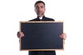 Priest holding empty blackboard copy space Royalty Free Stock Photo