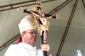 Priest is holding the image of Jesus on the cross on the traditional first Friday of 2023