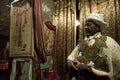 Priest holding a large cross, Lalibela