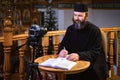 . Priest online. An Orthodox priest is recording a video for his blog. Preaching during a pandemic