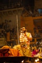 Priest performing ganga aarti at dasaswamedh ghat in varanasi