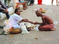 Priest performing religious ceremony with his devotee