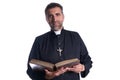 Priest portrait with Holy Bible in hands