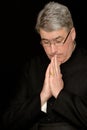 Priest in prayers