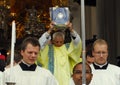 priest folding his hands for prayer