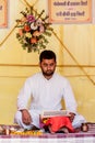 A Priest reading a Hindu Scripture Royalty Free Stock Photo
