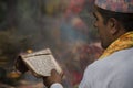 Priest reading prayers during hindu ceremony Royalty Free Stock Photo