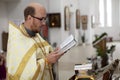 The priest reads a prayer. Royalty Free Stock Photo