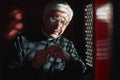 Priest with rosary listening to confession