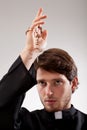 Priest with rosary