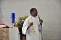 Priest speaking at Catholic celebration