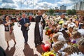 The priest sprinkles the crowd with holy water. Balashikha, Russia.