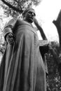 Priest Statue with Bible