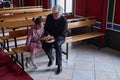 Priest teaching religion to little girl Royalty Free Stock Photo