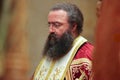 Priest in traditional clothing conducting a religious ceremony in Aleppo, Syria