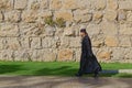 Priest walking along western edge of the Jerusalem Old City