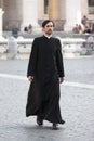 Priest walking (Vatican City) Royalty Free Stock Photo
