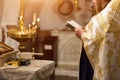 Priest wearing gold robe on ceremony in christian cathedral church, holy sacramental event.