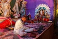 Priest worshiping in Hindu temple